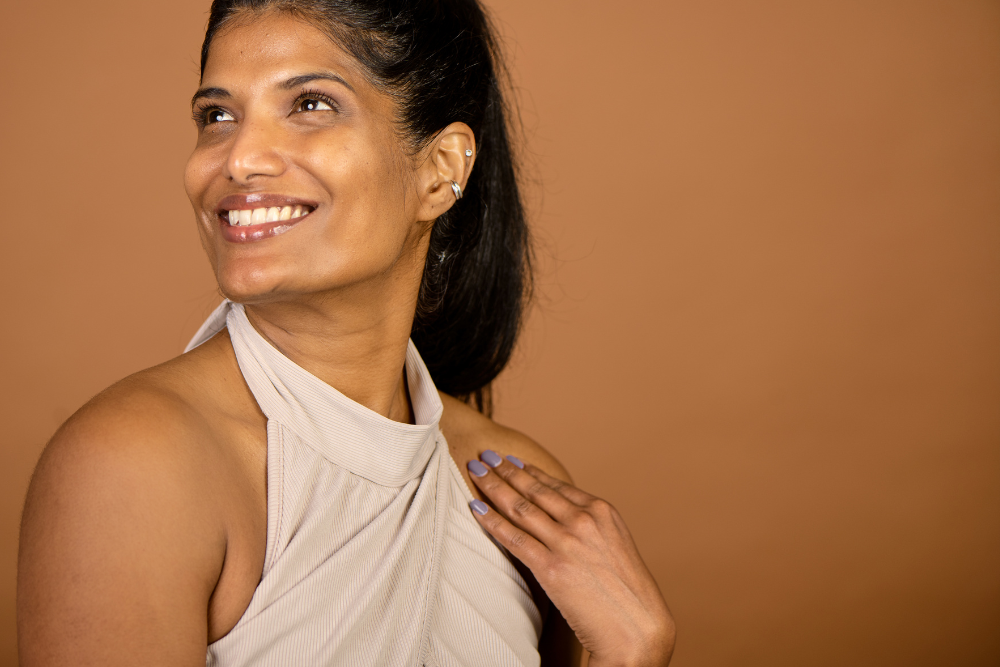 A man holding a smartphone and coffee cup, exemplifying an active lifestyle supported by the Best Antenatal and Postnatal Physiotherapy in JP Nagar.
