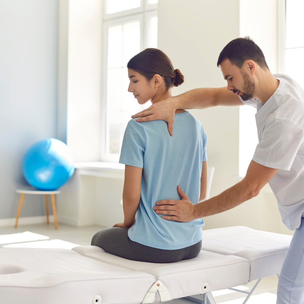 Athlete holding an injured ankle, symbolizing sports injury recovery at the best sports injury physiotherapy in JP Nagar.